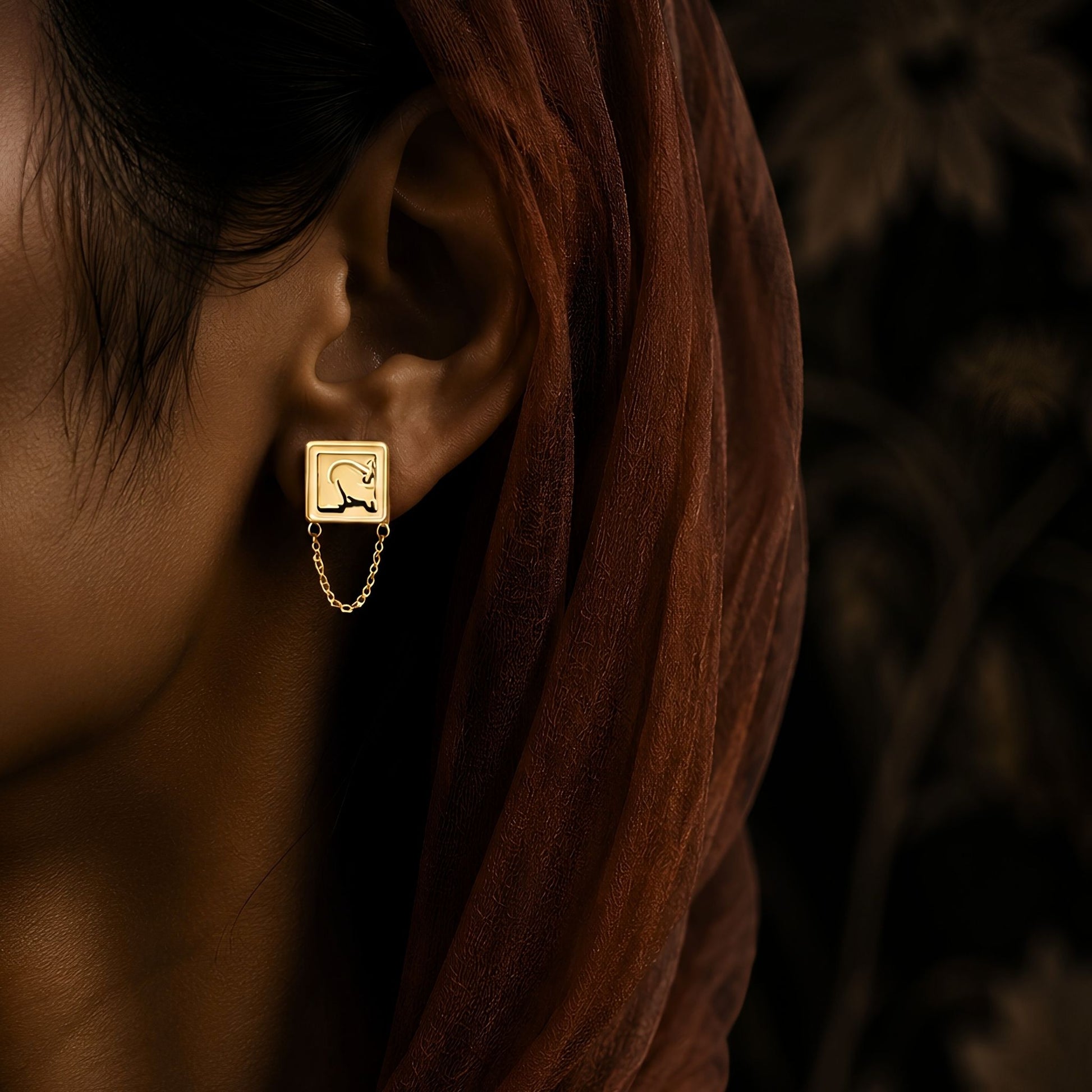 Gold plated adl rahma earring featuring Arabic calligraphy by FABLED
