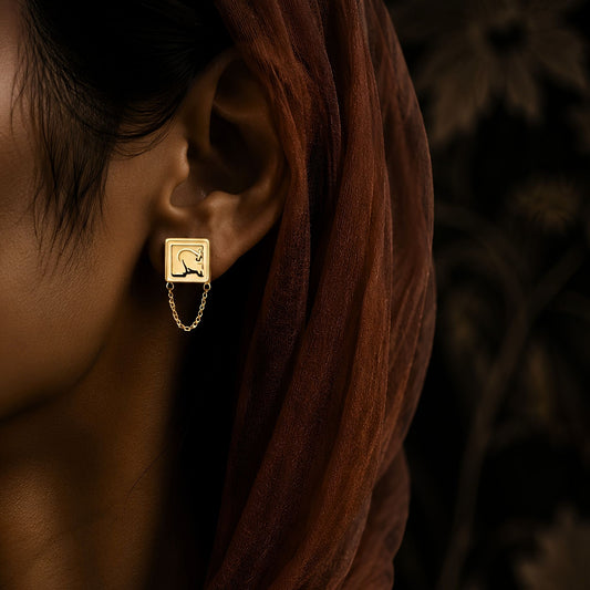 Gold plated adl rahma earring featuring Arabic calligraphy by FABLED