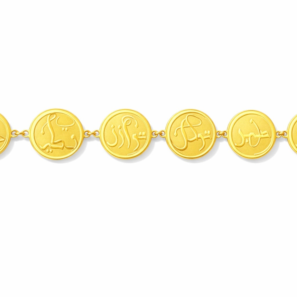 Close-up detail of the FABLED gold plated coin calligraphy bracelet 