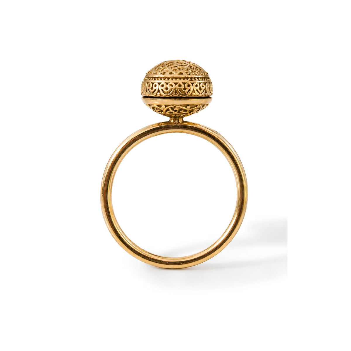 Henna inspired gold plated ring with intricate design on a white background.