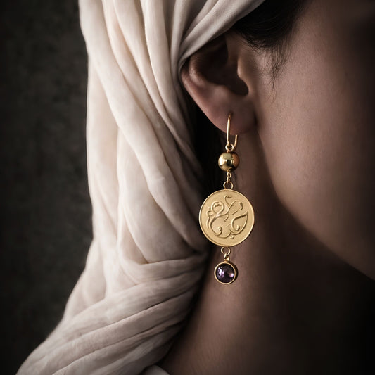 Gold plated haya earring featuring Arabic calligraphy by FABLED