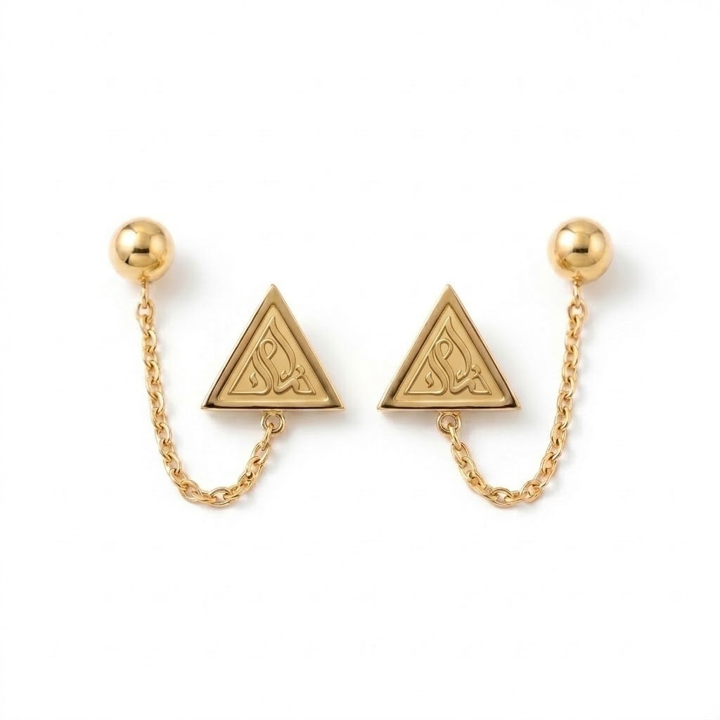 Close-up detail of the FABLED gold plated iman calligraphy earrings