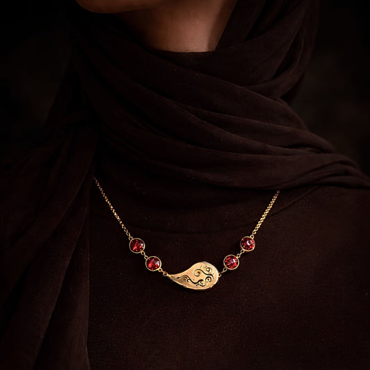Gold plated Qalbi necklace featuring Arabic calligraphy by FABLED