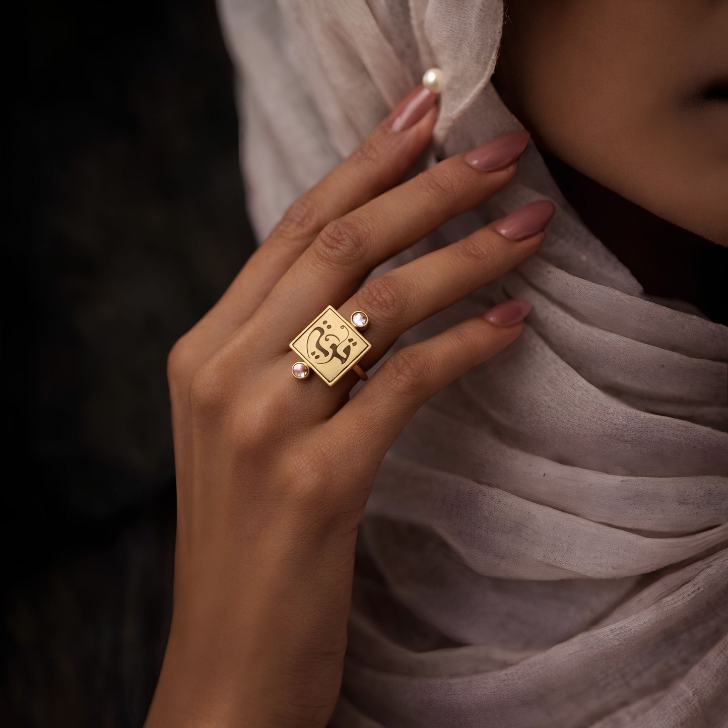 Gold qawwiyah ring featuring Arabic calligraphy by FABLED
