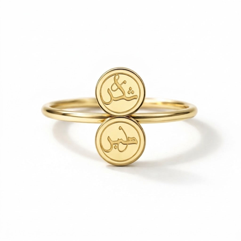 Close-up detail of the FABLED gold plated Sabr and shukr calligraphy ring 