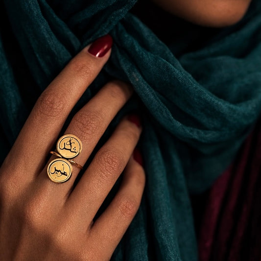 Gold Sabr and shukr ring featuring Arabic calligraphy by FABLED