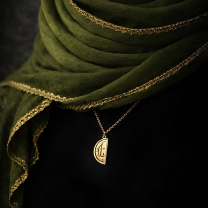 Gold plated Salaam necklace featuring Arabic calligraphy by FABLED