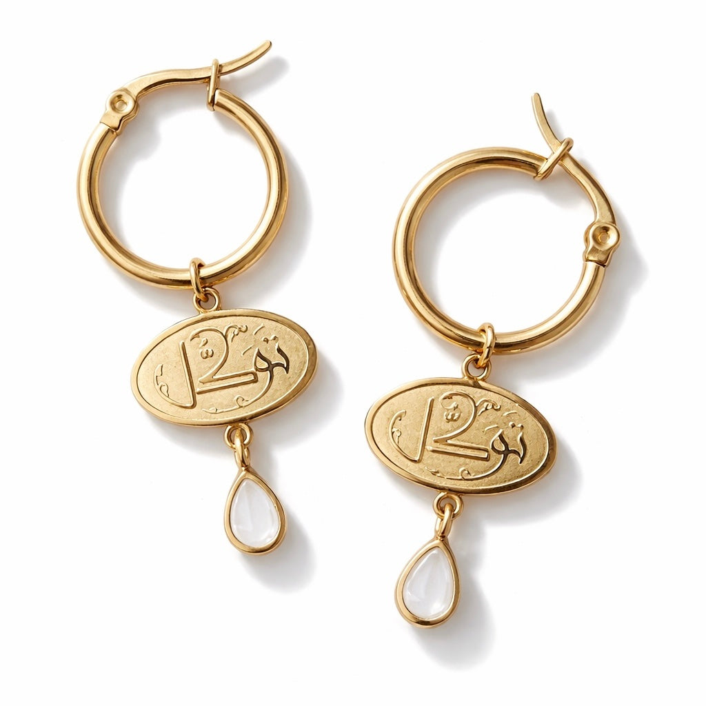 Close-up detail of the FABLED gold plated tawakkul calligraphy earring 