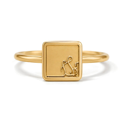Close-up detail of the FABLED gold plated tawakkul calligraphy ring