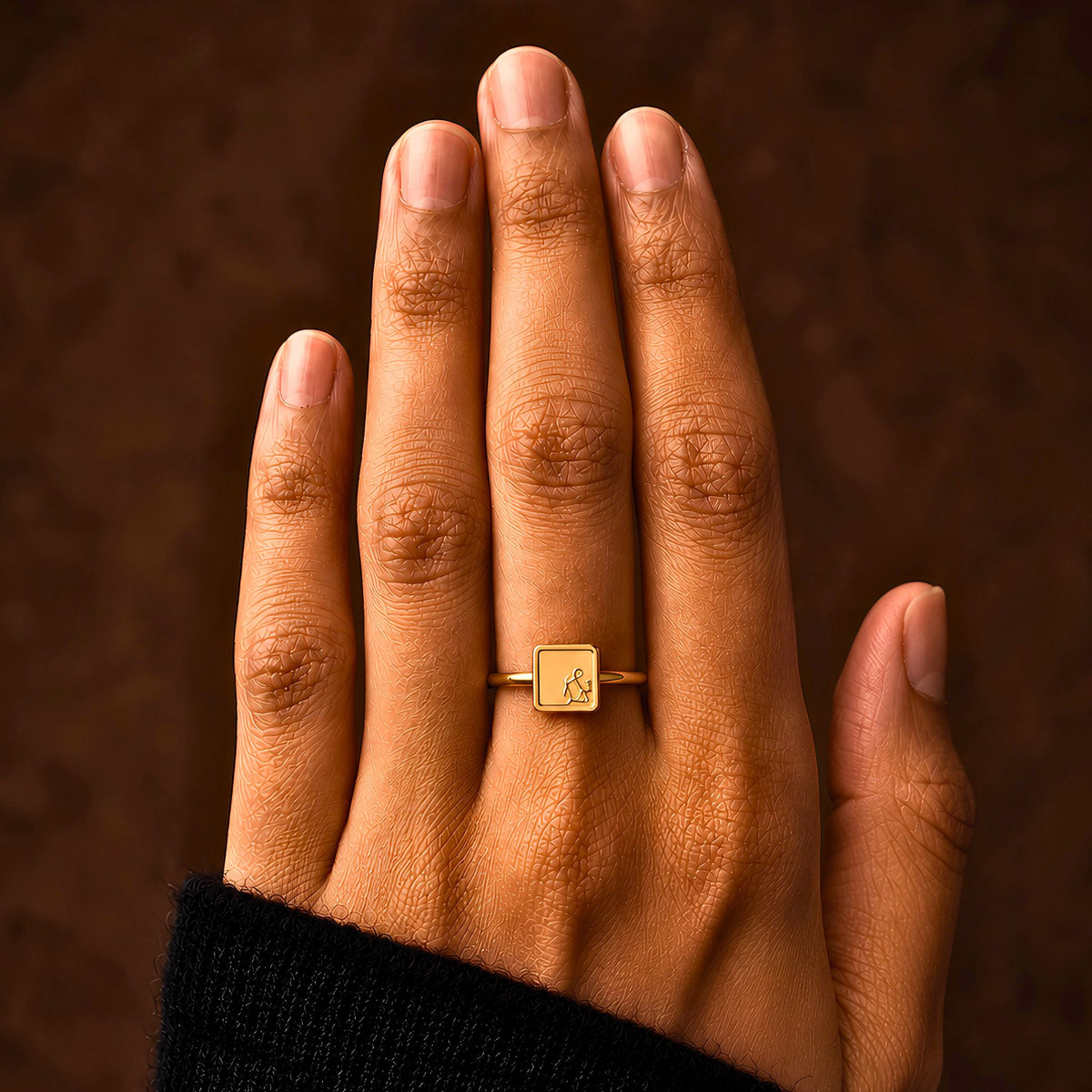 Gold plated tawakkul ring featuring Arabic calligraphy by FABLED.