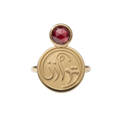 Close-up detail of the FABLED gold plated tawazun calligraphy ring 