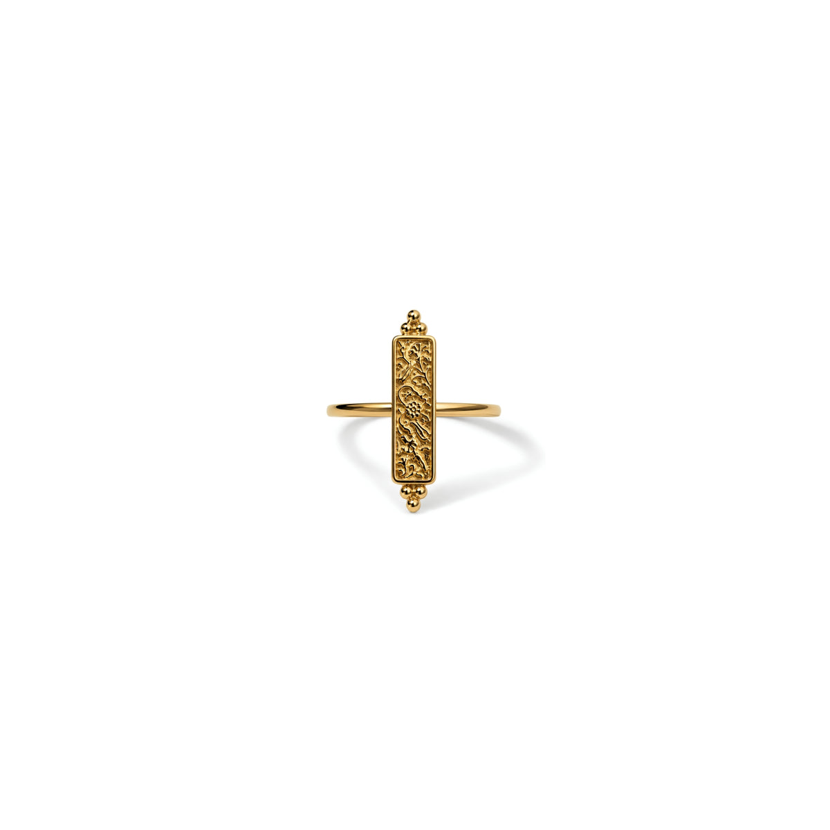 A gold plated ring with vintage floral motif in an antique finish, framed within a thin panel and crowned by stacked bead bookends, centered on a clean white background.