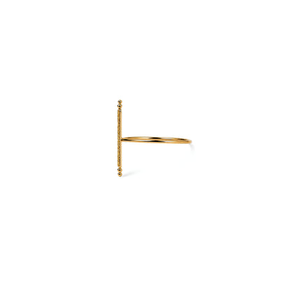 A delicate gold plated ring featuring a vertical bar with small bead accents on one end and a thin circular band, shown on a plain white background.